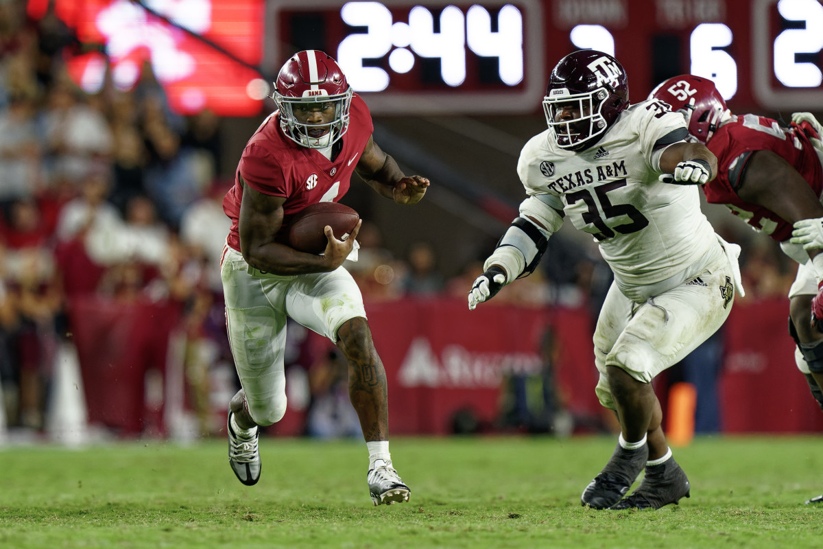 Oct 8, 2022; Tuscaloosa, Alabama, USA; Alabama Crimson Tide quarterback Jalen Milroe (4) carries the ball against Texas A&M Aggies during the second half at Bryant-Denny Stadium.